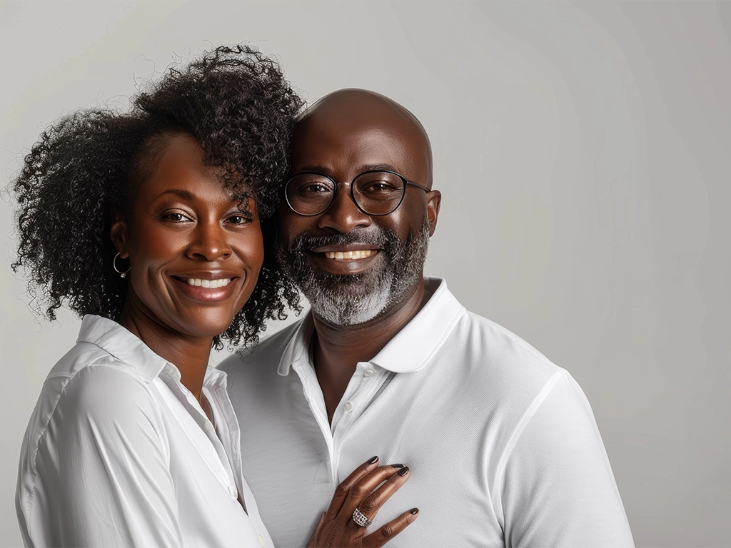 older couple wearing a classic white shirt in blank studio backdrop_LG
