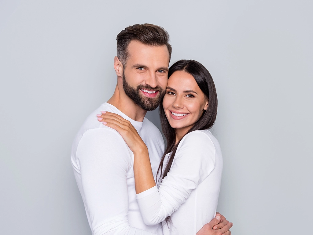 portrait of attractive cute cheerful couple cuddling_LG